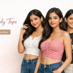 Indian women wearing elegant kurtis with embroidery and traditional styling in a soft neutral background.