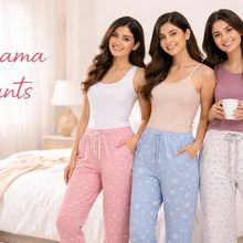 Indian women modeling cozy pajama pants with relaxed fit in soft pastel tones and comfortable styling.