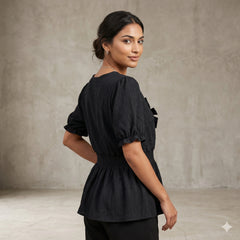 Elegant Black Smocked Peplum Top with Puff Sleeves