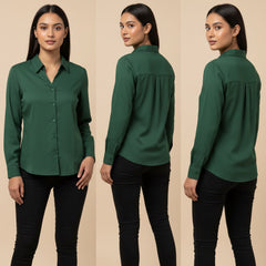 Green shirt worn by a model on a beige background