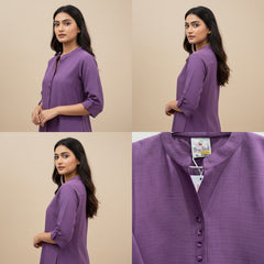 Purple shirt worn by a model on a beige background, with close-up of shirt fabric and tag.