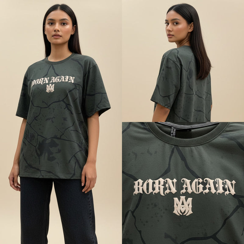 Person wearing a dark green t-shirt with 'Born Again' text, shown from front and back, on a beige background.