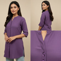 Purple shirt worn by a model with close-up details on a beige background