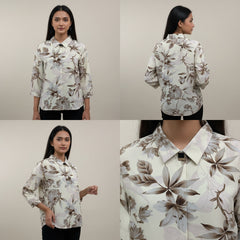 Floral patterned shirt shown from front, back, and side views on a neutral background.