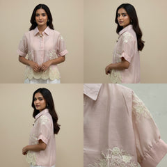 Woman wearing a light pink traditional outfit with floral embroidery, shown from different angles.