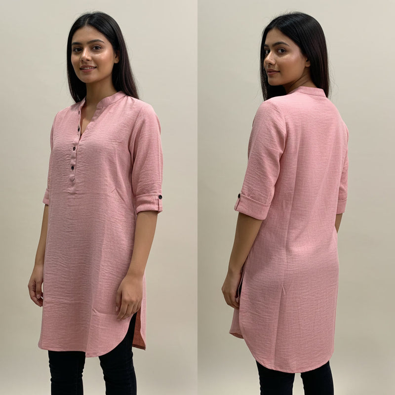 Woman wearing a pink kurta from front and back views against a plain background