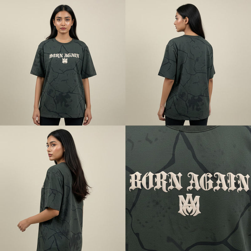 Dark green t-shirt with 'Born Again' text worn by a model on a beige background