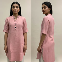 Woman wearing a pink kurta from front and side views against a plain background