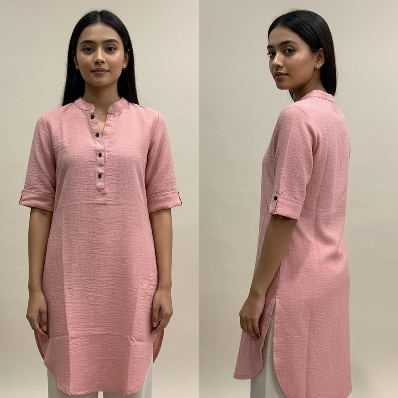 Woman wearing a pink kurta from front and side views against a plain background