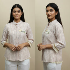 Two identical images of a woman wearing a striped shirt with a visible brand logo on a beige background.