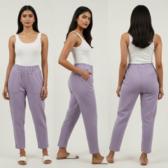 Woman modeling a white top and lavender pants from front, side, and back views on a white background.