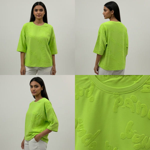 Green t-shirt with branding displayed from front, back, and close-up on a white background